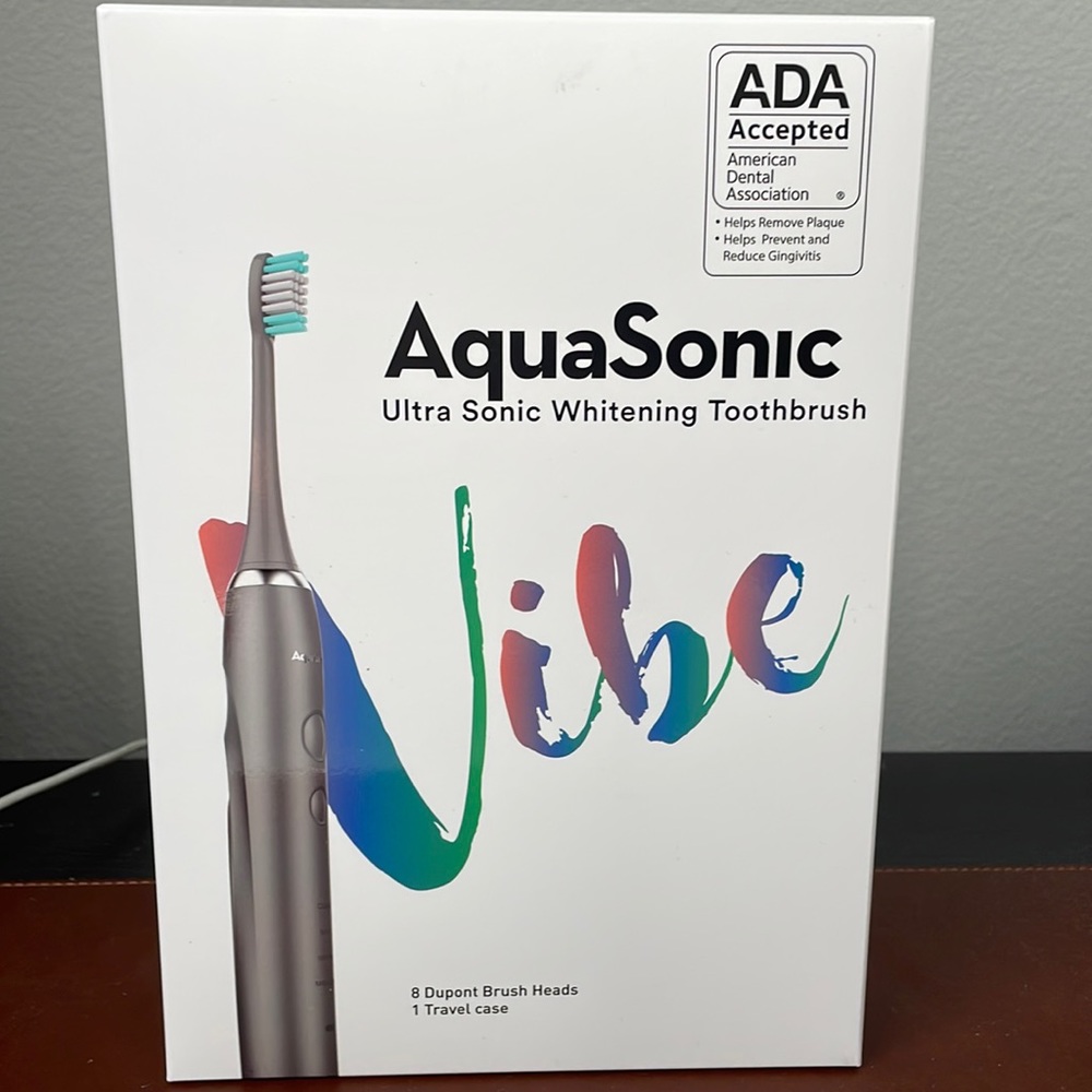 Electronic ultra Sonic whitening toothbrush brand Aquasonic,